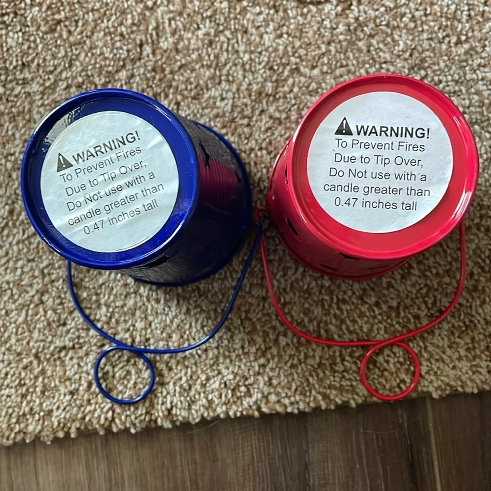 Red and Blue metal candle holders with star cut outs